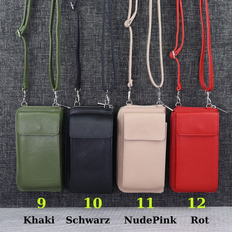May include: Four leather phone cases with straps. The cases are in khaki, black, nude pink, and red. The cases are numbered 9, 10, 11, and 12. The colors are labeled below the cases as Khaki, Schwarz, NudePink, and Rot.