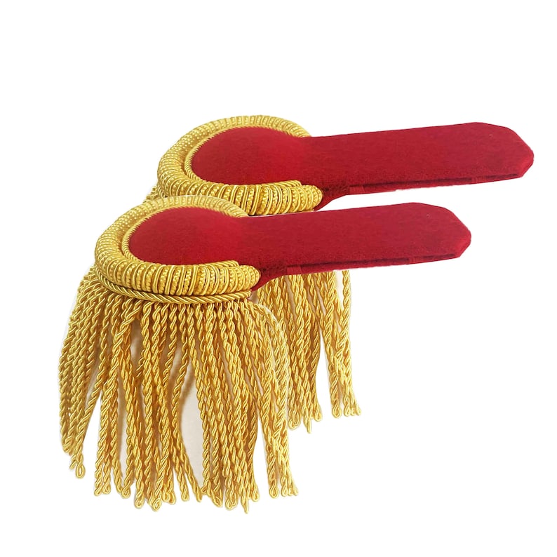 May include: Two red and gold military style shoulder boards with gold fringe.