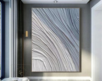 May include: A large rectangular wall art piece featuring a thick, textured impasto application of white and light grey paint. The surface displays diagonal, sweeping ridges and deep grooves that create a sense of movement and depth.
