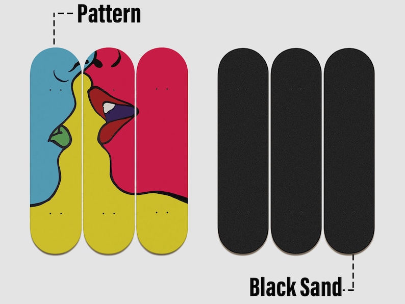 May include: Three skateboard decks with a colorful graphic of two faces kissing on the left and black sand grip tape on the right. The graphic features a blue face, a yellow face, and a red face.