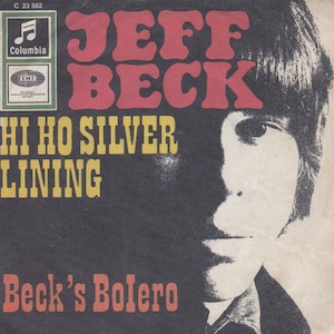 May include: Vintage Jeff Beck record album cover. The album cover features the text "JEFF BECK" in red bubble letters, and "HI HO SILVER LINING" in yellow. The album title "Beck's Bolero" is in red. A black and white image of a man is on the right.