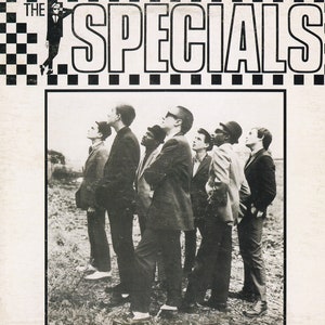 Los Especiales - Los Especiales - Póster original vintage en miniatura con marco de cartón negro