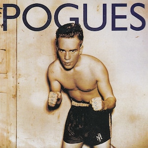 Póster original en miniatura vintage con marco de cartón negro: The Pogues: Paz y amor