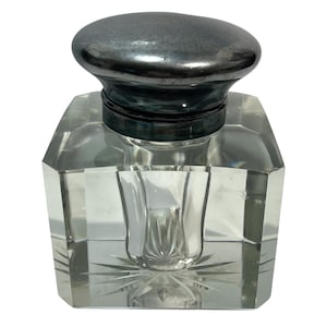 May include: A set of three ceramic mugs with a speckled, matte finish. The mugs are in shades of cream, light gray, and dark gray. Each mug has a simple, minimalist design, perfect for coffee or tea.