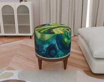 May include: A round ottoman featuring a vibrant, abstract pattern of swirling green, teal, and yellow hues. The upholstered seat is supported by four tapered, dark brown wooden legs, providing a stable base for this functional piece of furniture.
