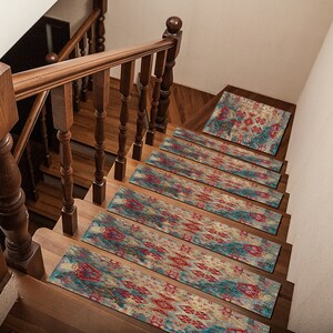 May include: A set of 7 stair treads with a colorful, abstract pattern in shades of blue, red, and beige. The treads are made of a soft, non-slip material and are perfect for adding a touch of style to any staircase.