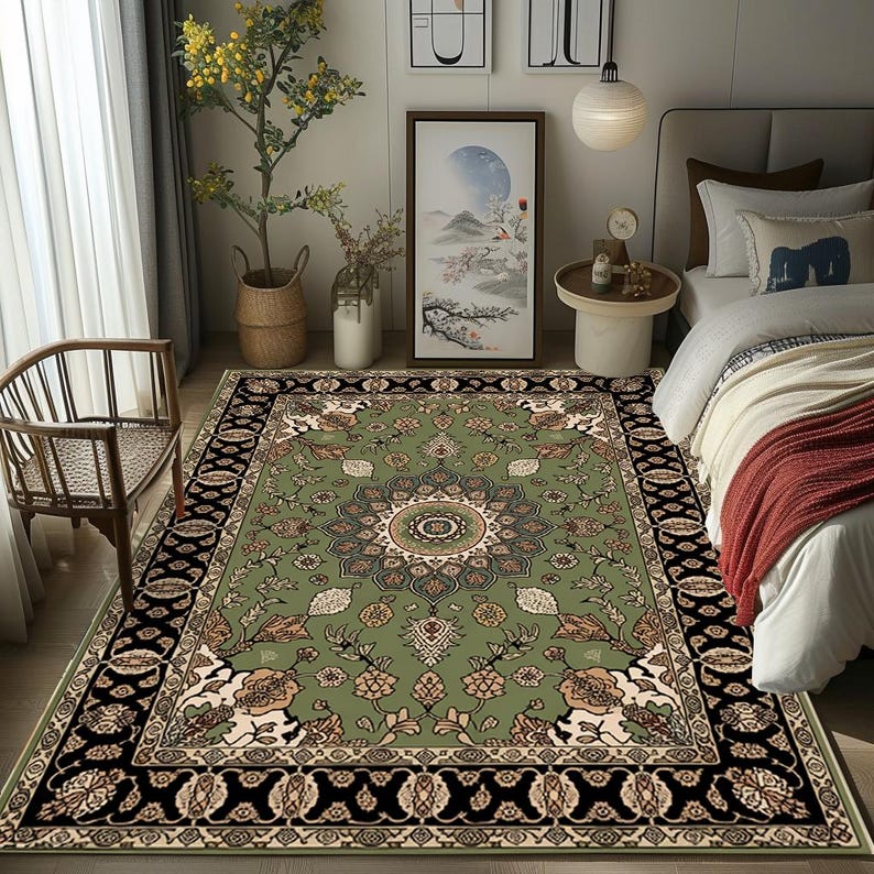 a cozy bedroom with a large, ornate rug on the floor, a wooden chair, a bed with a red blanket, and various decorative elements such as a painting, a clock, and a vase.