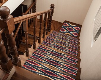 May include: A set of 7 stair treads with a geometric pattern in shades of blue, red, and yellow. The treads are made of a soft, non-slip material and are perfect for adding a touch of style to any staircase.