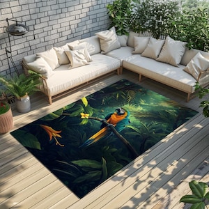 May include: A blue and yellow macaw perched on a branch in a lush green jungle setting. The rug features a tropical rainforest design with vibrant foliage and a realistic depiction of the bird.