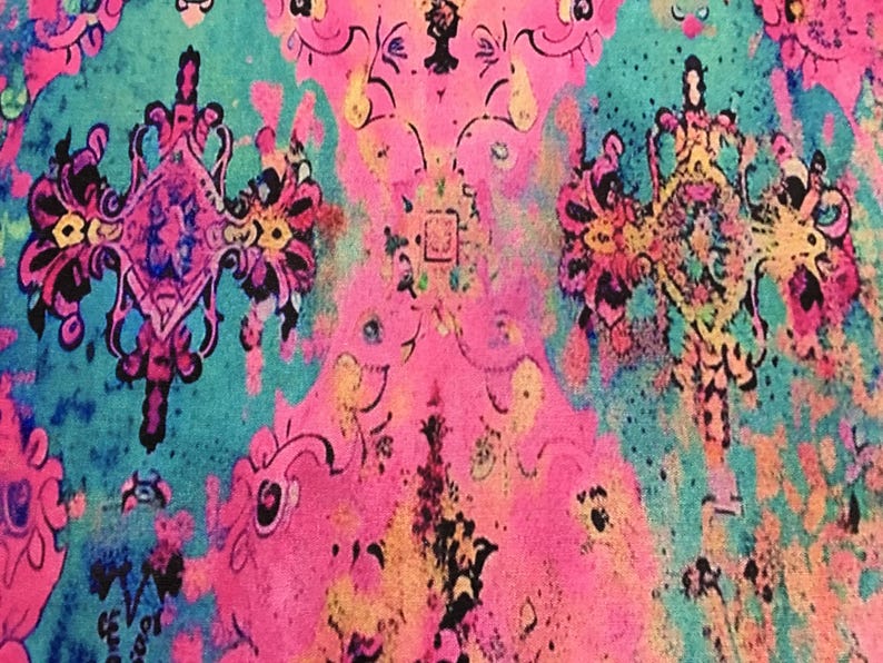 The image is a vibrant and colorful abstract pattern, featuring a mix of pink, blue, yellow, and green hues. The pattern is composed of various shapes and designs, creating a visually striking and dynamic composition.