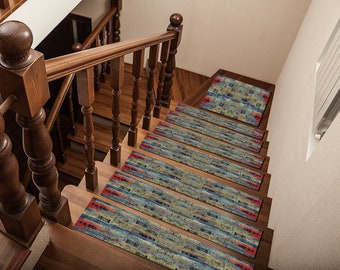 May include: A set of eight stair treads featuring a colourful abstract pattern in shades of blue, red, and yellow. The treads are made from a soft, durable material and are designed to add a touch of style and comfort to any staircase.