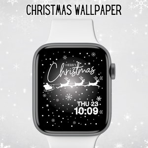 Può includere: Un quadrante di Apple Watch bianco con sfondo nero e un design natalizio bianco. Il design include le parole "Buon Natale" con Babbo Natale su una slitta trainata da renne. L'ora è visualizzata come "GIO 23 10:09".