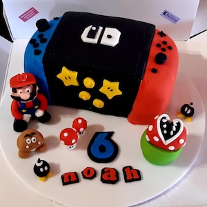 Inofficiella handhållna switch-tårtdekorationer