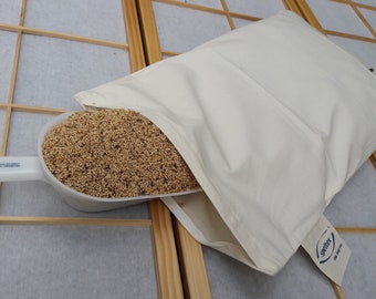 Dosing and filling scoop for natural grain shell fillings
