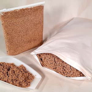 Pillows and travel pillows made from organic millet husks with rubber in three sizes image 1