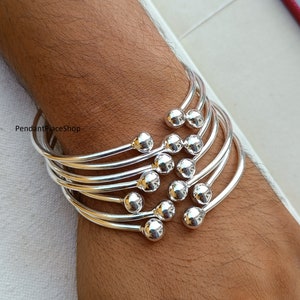 Sterling Silver Stacking Bangles: West Indian Style, Set of 9