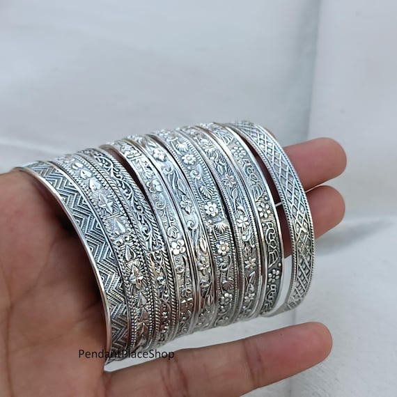 9-piece Sterling Silver Flower Bangle Set: Western Indian Jewelry