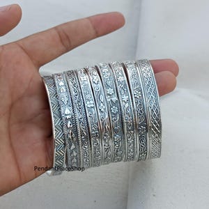 9-delat armbandsset med blommor i sterlingsilver: Västindiska smycken