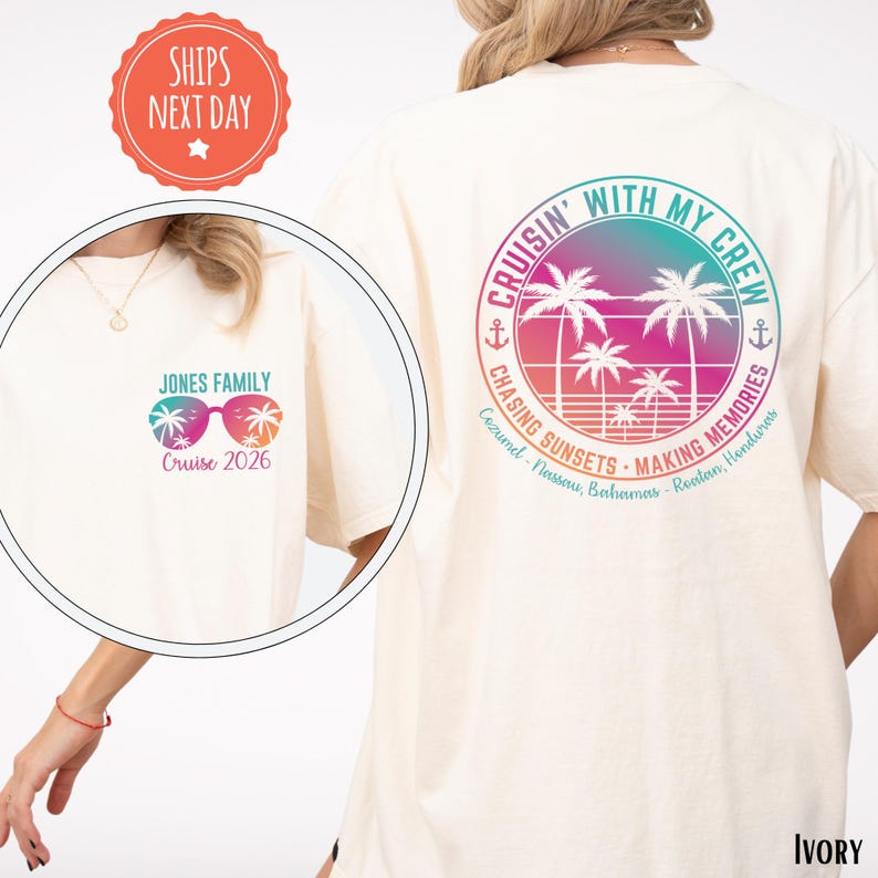 A person wearing a white t-shirt with a colorful graphic design featuring a beach scene with palm trees and a sunset. The text on the t-shirt reads "CRUISIN' WITH MY CREW" and "JONES FAMILY Cruises 2026".