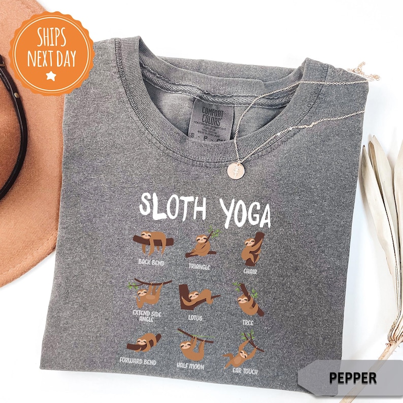 a hat, sunglasses, and t - shirt with the words sloth yoga on