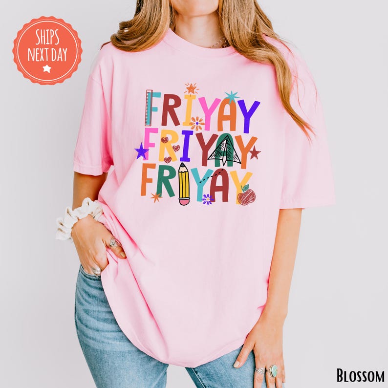 A woman wearing a pink t-shirt with the text "FRIDAY FRIDAY FRIDAY" printed on it.
