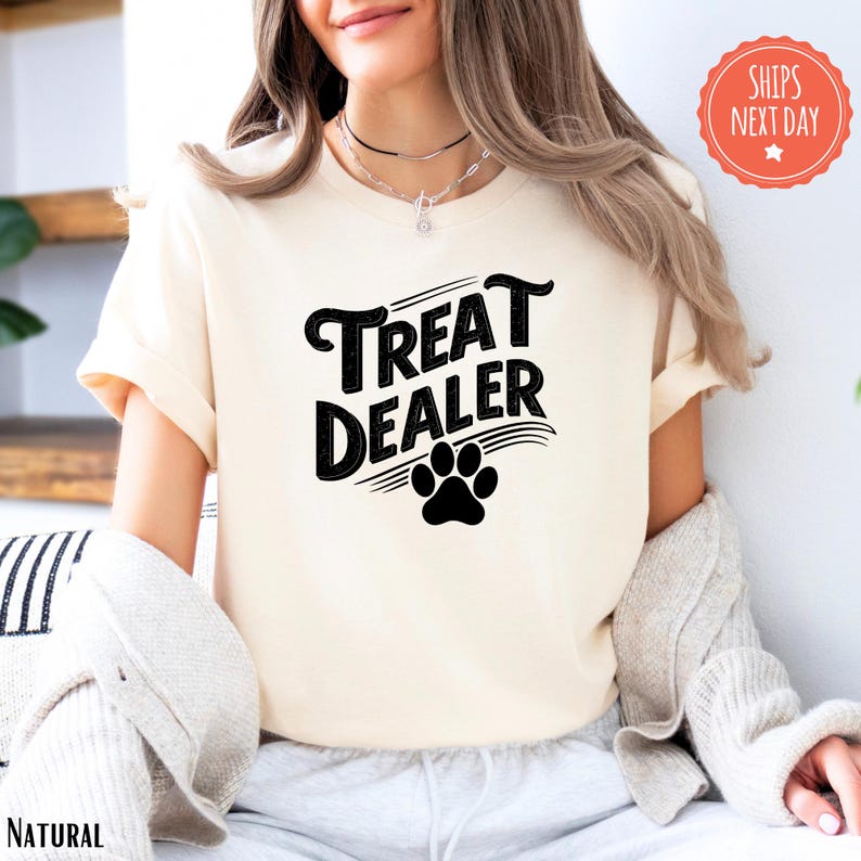 a woman wearing a t - shirt that says treat dealer