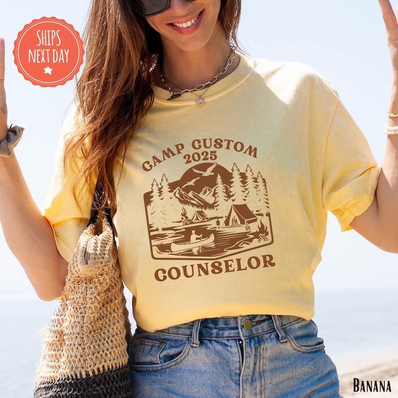 a woman wearing a shirt that says camp custom