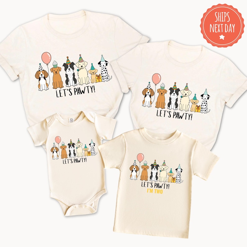three white t-shirts with a design featuring cartoon dogs wearing party hats and the text "Let's pawty!" printed on them.