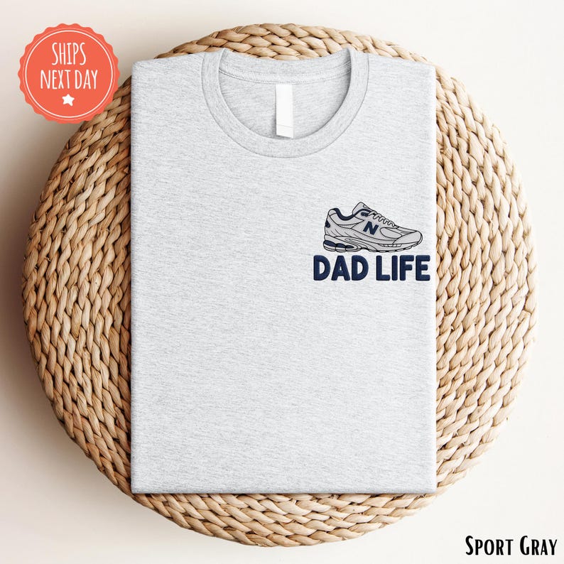 a t - shirt with the words dad life on it
