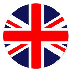 May include: A circular sticker featuring the Union Jack flag. The flag is red, white and blue. The red cross is in the centre of the flag.