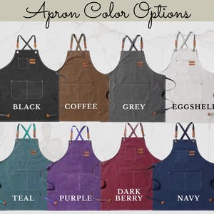 May include: Aprons in various colors: black, coffee, grey, eggshell, teal, purple, dark berry, and navy. Each apron has a pocket and leather accents. The text "Apron Color Options" is at the top.