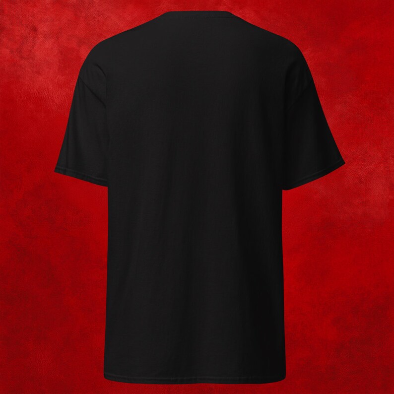 May include: A black short-sleeved t-shirt with a crew neck.