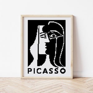 May include: Black and white pixel art print of a portrait by Pablo Picasso, with the artist's name printed below the image.