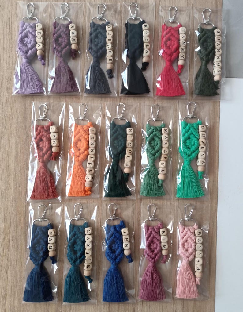 Customizable Macrame Name Keychain with a lots color options. 44 different rope colors and 10 different hook types, Perfect gift ideas for bridesmaids, friends and family. 
Macrame Name Keyring, Macrame Wedding favors, Bridesmaid Proposals, will you be my bridesmaids, maid of honor gift, matron of honor gifts, gift for friends, christmas gifts for friends and co-workers, macrame bag charm, birthday gifts ideas, mothers day gifts, womens day gifts, gift for women, gift for mom, gift for her,
