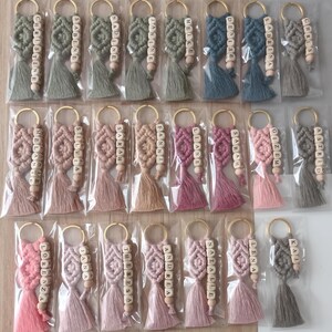 Customizable Macrame Name Keychain with a lots color options. 44 different rope colors and 10 different hook types, Perfect gift ideas for friends and family. 
Macrame Name Keyring, Macrame Wedding favors, Bridesmaid Proposals, will you be my bridesmaids, maid of honor gift, matron of honor gifts
 gifts for her, gifts for friends, christmas gifts for friends and co-workers, macrame bag charm, birthday gifts ideas, baby shower gifts, teacher appreciation gifts, co-worker gifts