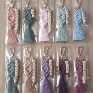 Customizable Macrame Name Keychain with a lots color options. 43 different rope colors and 10 different hook types, Perfect gift ideas for friends and family. 
Macrame Name Keyring, Macrame Wedding favors, Bridesmaid Proposals, will you be my bridesmaids, maid of honor gift, matron of honor gifts
 gifts for her, gifts for friends, christmas gifts for friends and co-workers, macrame bag charm, birthday gifts ideas, christmas gifts, employees gifts, gifts for friends, wedding favors, name keyring