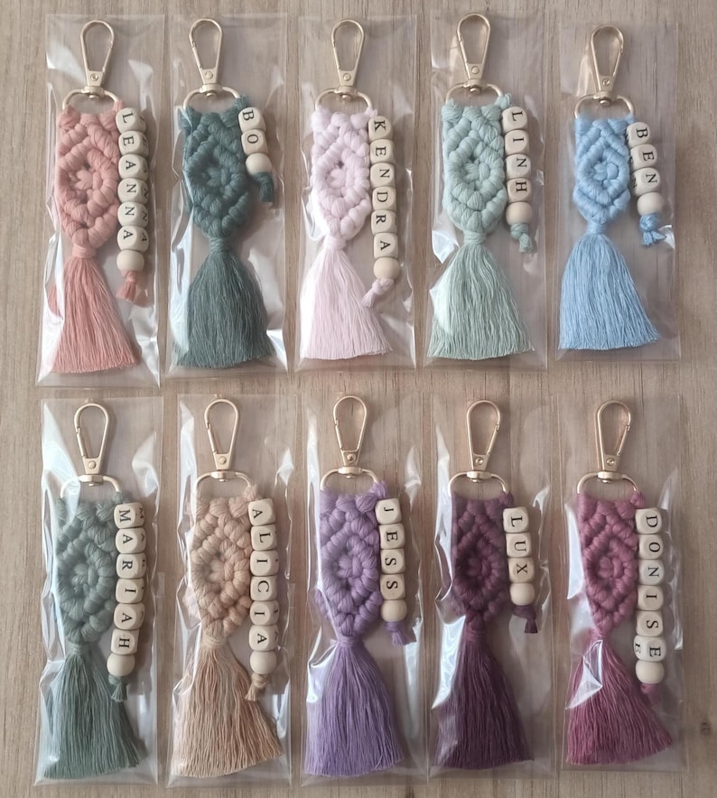 Customizable Macrame Name Keychain with a lots color options. 43 different rope colors and 10 different hook types, Perfect gift ideas for friends and family. 
Macrame Name Keyring, Macrame Wedding favors, Bridesmaid Proposals, will you be my bridesmaids, maid of honor gift, matron of honor gifts
 gifts for her, gifts for friends, christmas gifts for friends and co-workers, macrame bag charm, birthday gifts ideas, christmas gifts, employees gifts, gifts for friends, wedding favors, name keyring
