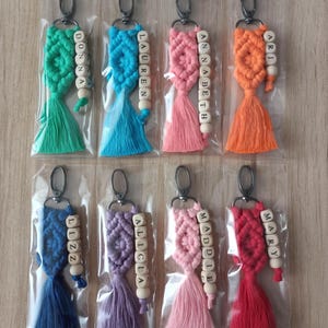 Customizable Macrame Name Keychain with a lots color options. 44 different rope colors and 10 different hook types, Perfect gift ideas for friends and family. 
Macrame Name Keyring, Macrame Wedding favors, Bridesmaid Proposals, will you be my bridesmaids, maid of honor gift, matron of honor gifts
 gifts for her, gifts for friends, christmas gifts for friends and co-workers, macrame bag charm, birthday gifts ideas, bridal shower favors, gift for her, bridesmaid proposal, mothers day gifts