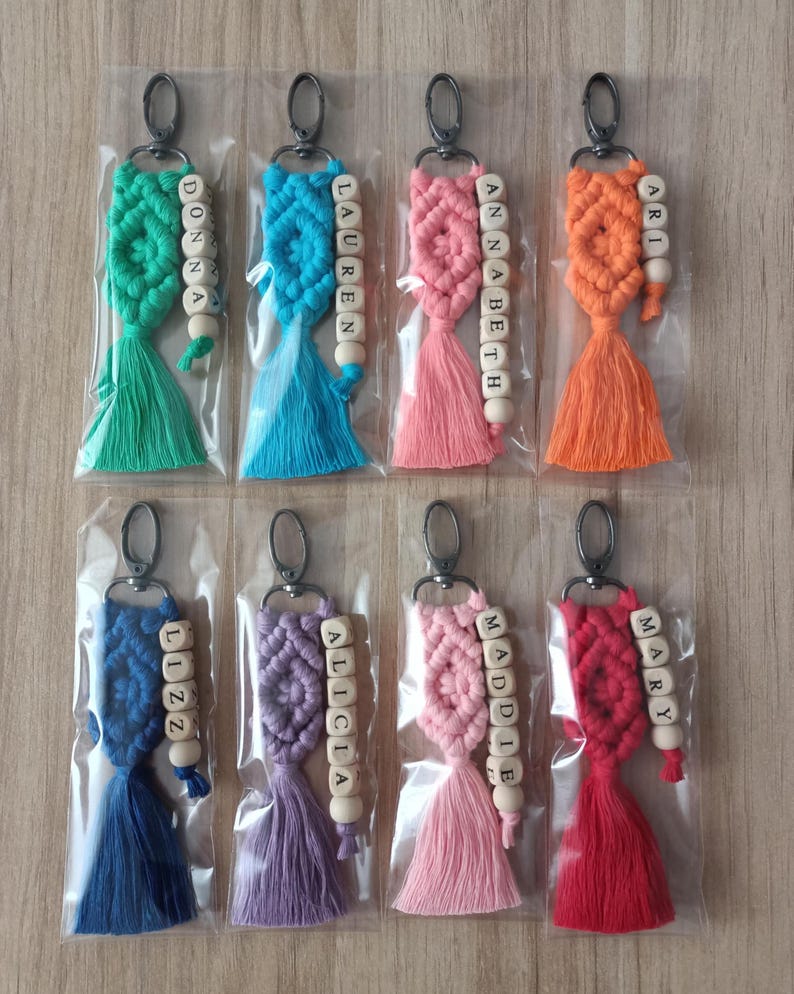 Customizable Macrame Name Keychain with a lots color options. 44 different rope colors and 10 different hook types, Perfect gift ideas for friends and family. 
Macrame Name Keyring, Macrame Wedding favors, Bridesmaid Proposals, will you be my bridesmaids, maid of honor gift, matron of honor gifts
 gifts for her, gifts for friends, christmas gifts for friends and co-workers, macrame bag charm, birthday gifts ideas, bridal shower favors, gift for her, bridesmaid proposal, mothers day gifts