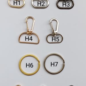 10 different hardware styles and colors including gold, silver, black clasps for keyrings.
Silver and gold hooks and rings. High quality products for your special day. For these gifts you can select whatever you want because it is your special day and we are here to make it your macrame handmade keychain gift more special and unique.
10 Clasp Styles - Match Your Vibe