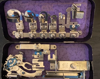 Vintage Greist sewing machine 9 Attachments in original tin