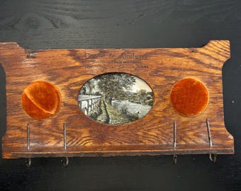 Vintage 1927 wood wall hanging.  for keys or thread.  Goode & Amsberry Insurance Lands and Loans  Milo Iowa 12” x 6”