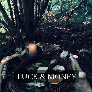 May include: An outdoor scene with a candlelit jar, animal skulls, and a woven nest. The text "LUCK & MONEY" is displayed across the bottom. The setting is a dark forest with a mystical theme.