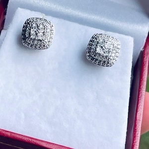 Sterling Silver and diamonds … very nice earrings on a post!