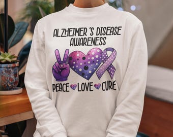 Suéter de concienciación sobre el Alzheimer, suéter Peace Love Cure, sudadera con lazo morado y corazón, apoyo a grupos de Alzheimer, regalo con lazo morado