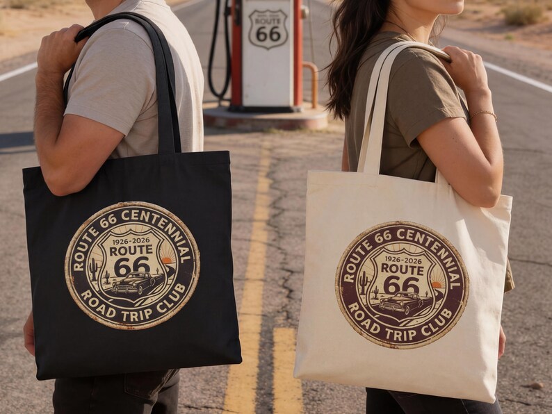 May include: Two tote bags, one black and one off-white, each featuring a circular Route 66 Centennial design. The design includes the text "Route 66", "1926-2026", and "Road Trip Club", with a vintage car illustration.