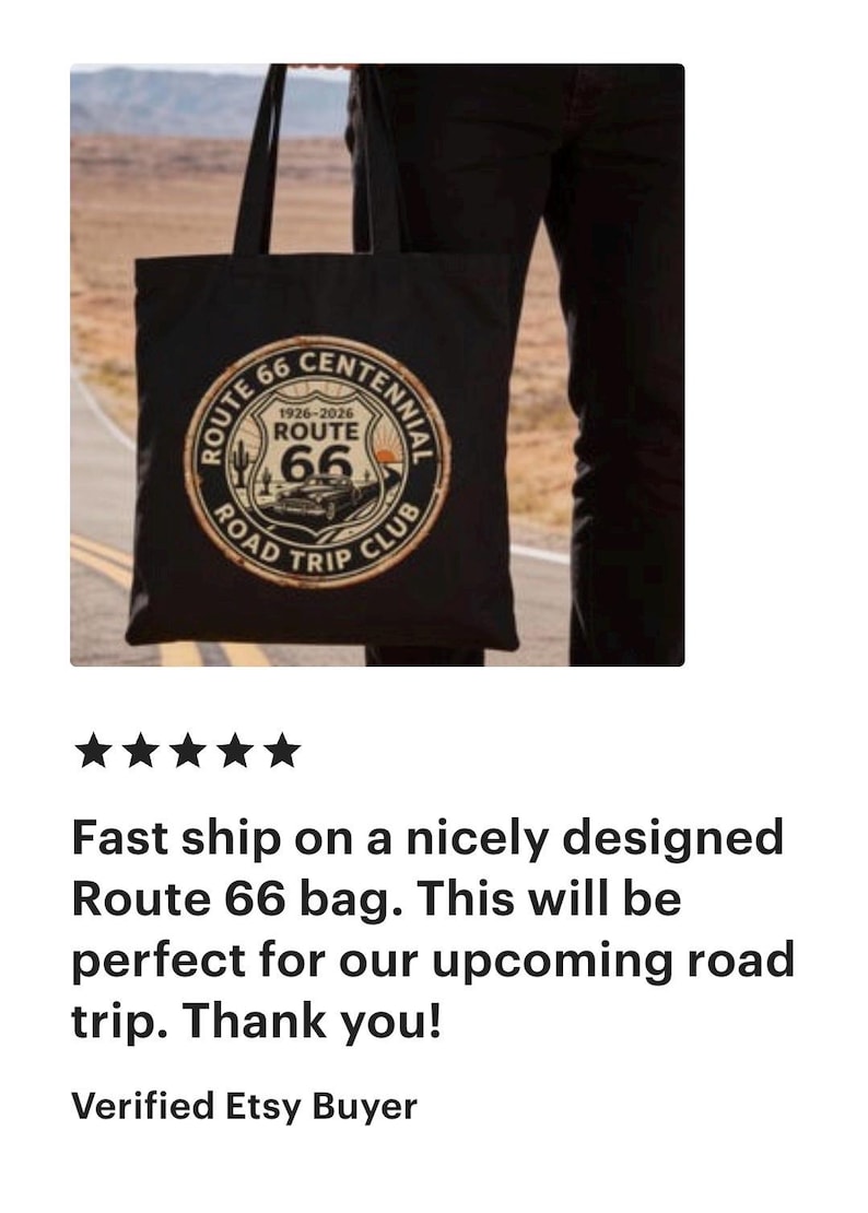 May include: Black tote bag featuring a Route 66 Centennial design with a vintage car graphic. The bag includes the text "Route 66 Road Trip Club" and the years 1926-2026.