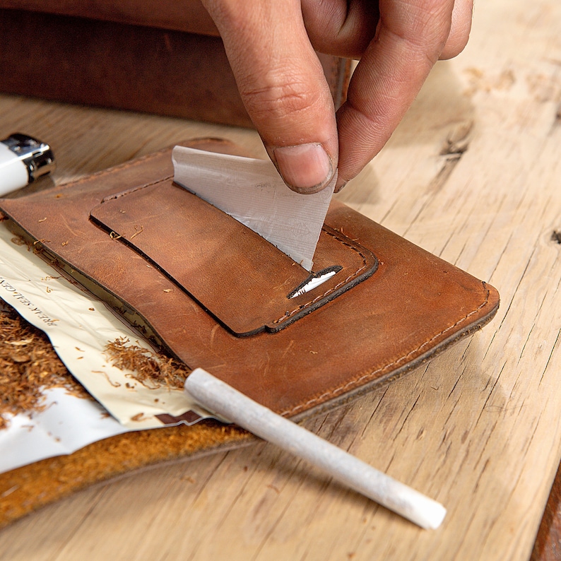 open look of the details of the rolling paper slots for tobacco pouch