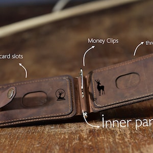 Open look of the Crazy dark brown wallet on the table. Featuring card slots, the money stainless steel clip and personalisation examples for Christmas.