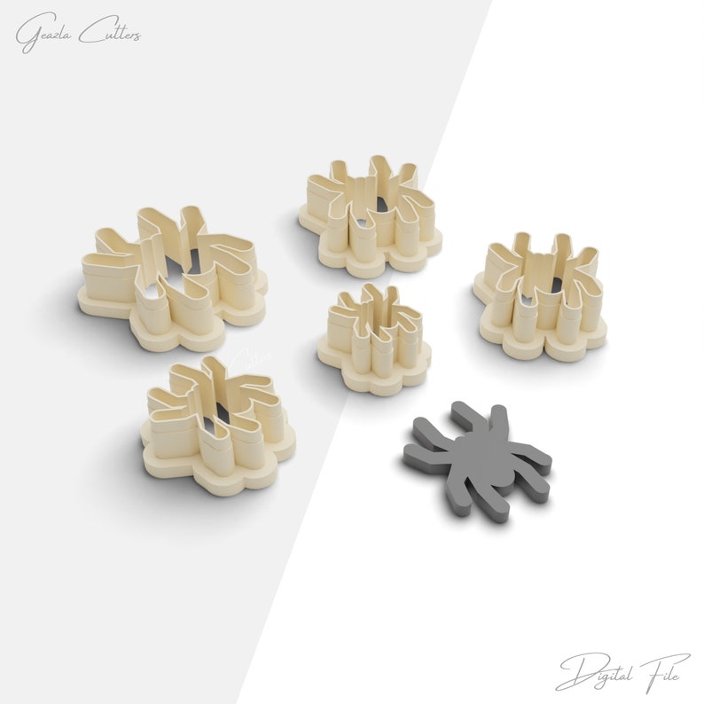 May include: Set of six cookie cutters in the shape of spiders. The cutters are beige and have a smooth finish. One cutter is gray and has a more detailed design.